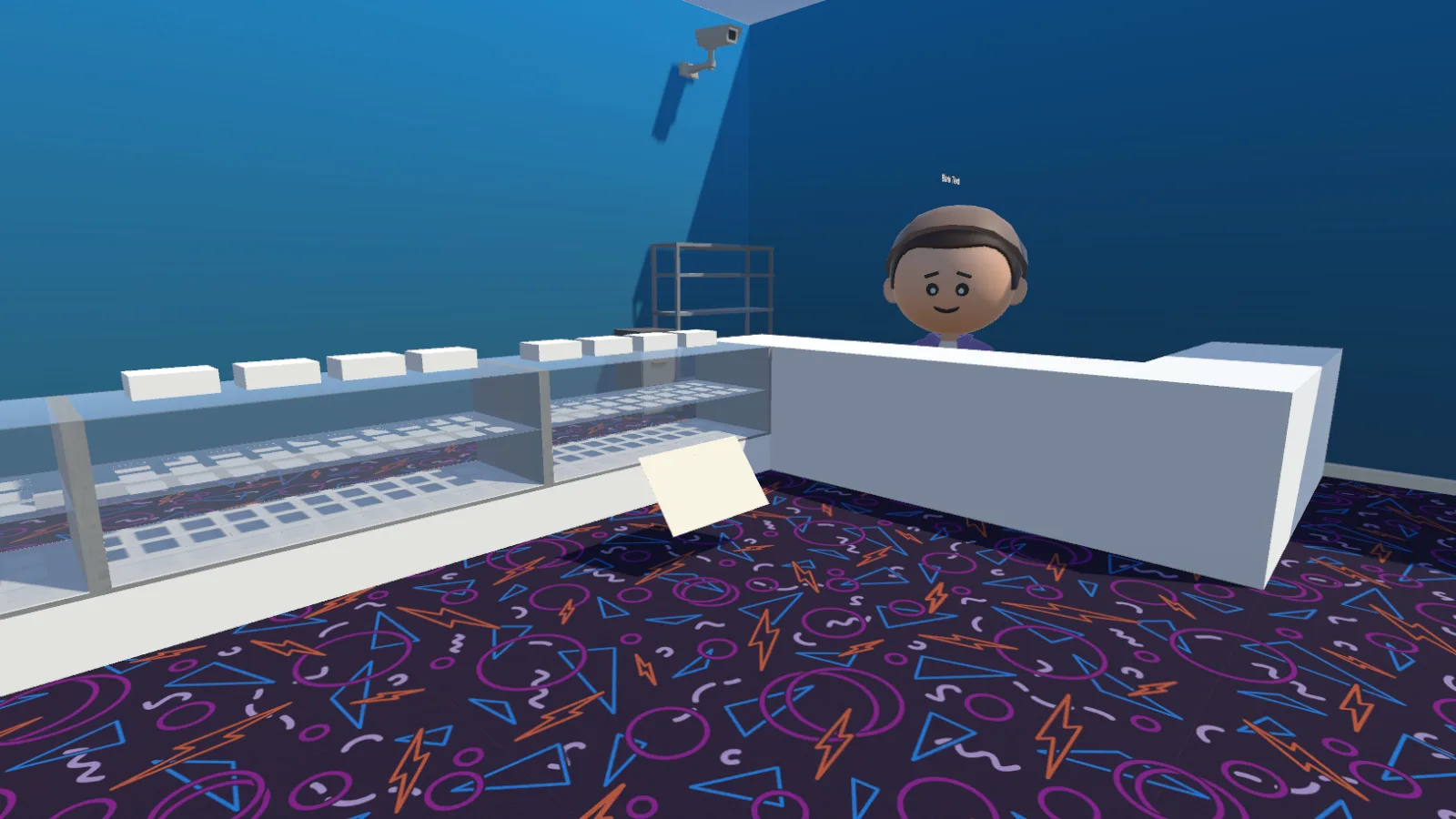 The shop owner behind the counter, next to the glass singles cabinets